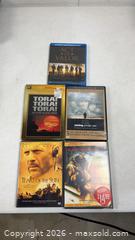 MaxSold Auction: 5 War Movie DVDs, untested - Dundee Township (Illinois, USA) PARTNER MANAGED Reseller Online Auction - Airport Road