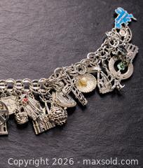 MaxSold Auction: Vintage Sterling Silver Charm Bracelet – Fully LOADED Sterling Charms - Newmarket (Ontario, Canada) SELLER MANAGED Downsizing Online Auction - Brimson Drive