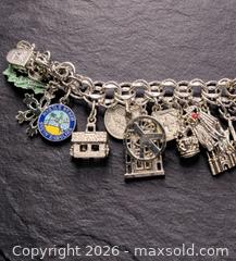 MaxSold Auction: Vintage Sterling Silver Charm Bracelet – Fully LOADED Sterling Charms - Newmarket (Ontario, Canada) SELLER MANAGED Downsizing Online Auction - Brimson Drive