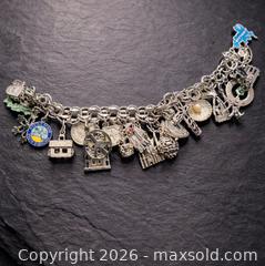 MaxSold Auction: Vintage Sterling Silver Charm Bracelet – Fully LOADED Sterling Charms - Newmarket (Ontario, Canada) SELLER MANAGED Downsizing Online Auction - Brimson Drive