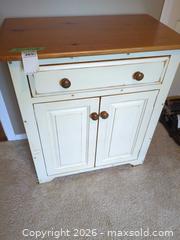 MaxSold Auction: Distressed Cream Wood Cabinet with Wood Top, 2 Doors & Drawer - Langford (British Columbia, Canada) PARTNER MANAGED Moving Online Auction - Hull Road