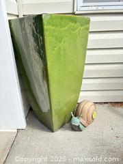 MaxSold Auction: Glazed Ceramic Tall Outdoor Planter with Snail Accent - Langford (British Columbia, Canada) PARTNER MANAGED Moving Online Auction - Hull Road