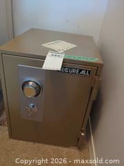 MaxSold Auction: SecureAll Small Steel Safe with Combination Dial & Key Lock - Langford (British Columbia, Canada) PARTNER MANAGED Moving Online Auction - Hull Road