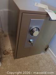 MaxSold Auction: SecureAll Small Steel Safe with Combination Dial & Key Lock - Langford (British Columbia, Canada) PARTNER MANAGED Moving Online Auction - Hull Road