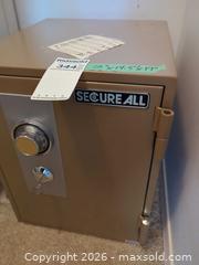 MaxSold Auction: SecureAll Small Steel Safe with Combination Dial & Key Lock - Langford (British Columbia, Canada) PARTNER MANAGED Moving Online Auction - Hull Road