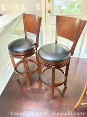 MaxSold Auction: Set of 2 Dark Brown Wood Bar Stools with Black Vinyl Seats - Langford (British Columbia, Canada) PARTNER MANAGED Moving Online Auction - Hull Road