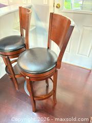 MaxSold Auction: Set of 2 Dark Brown Wood Bar Stools with Black Vinyl Seats - Langford (British Columbia, Canada) PARTNER MANAGED Moving Online Auction - Hull Road