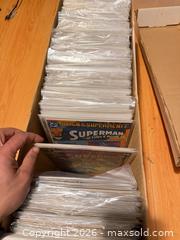 MaxSold Auction: Long comic box full  - Toronto (Ontario, Canada) SHORT NOTICE SELLER MANAGED Downsizing Online Auction - Applefield Drive