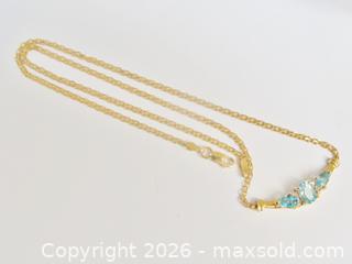 MaxSold Auction: 14K Gold Blue Topaz Diamond Accent Curved Bar Necklace  - Aurora (Ontario, Canada) PARTNER MANAGED Downsizing Online Auction - Murray Drive