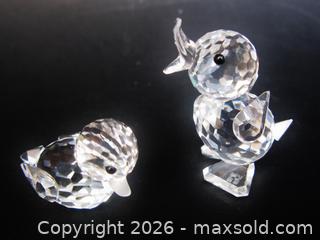 MaxSold Auction: 2 Swarovski Miniature Ducks  - Aurora (Ontario, Canada) PARTNER MANAGED Downsizing Online Auction - Murray Drive