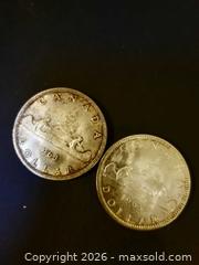 MaxSold Auction: Canadian Silver Dollars, 1963, 1965 - Aurora (Ontario, Canada) PARTNER MANAGED Downsizing Online Auction - Murray Drive