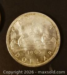 MaxSold Auction: Canadian Silver Dollars, 1963, 1965 - Aurora (Ontario, Canada) PARTNER MANAGED Downsizing Online Auction - Murray Drive