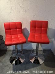 MaxSold Auction: Pair of Red Adjustable Swivel Bar Stools with Chrome Bases - Pickering (Ontario, Canada) SELLER MANAGED Reseller Online Auction - Regan Place