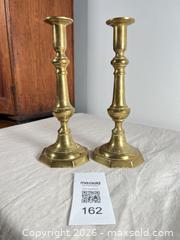 MaxSold Auction: Pair of antique 10 inch brass push up candlesticks  - Ottawa (Ontario, Canada) SELLER MANAGED Downsizing Online Auction - Daly Avenue