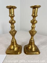 MaxSold Auction: Pair of antique brass push-up candlesticks  - Ottawa (Ontario, Canada) SELLER MANAGED Downsizing Online Auction - Daly Avenue