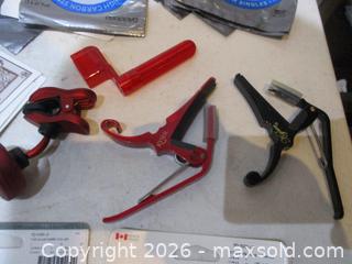 MaxSold Auction: 24 Unopened Sets Of Accoustic And Electric Guitar Strings Various Makers With 65 Unused Single Guitar Strings Various Makers. Tuner & Capo's. - Toronto (Ontario, Canada) SELLER MANAGED Estate Sale Online Auction - Annette Street