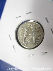 MaxSold Auction: Ancient Greek Silver Drachm Currency Coin. Inverted Heads Of Zeus. 300 BC To 200 BC. - Toronto (Ontario, Canada) SELLER MANAGED Estate Sale Online Auction - Annette Street