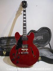 MaxSold Auction: GROTE Electric Guitar With Hard Shell Guitar Case & Two New Packs Of Strings. - Toronto (Ontario, Canada) SELLER MANAGED Estate Sale Online Auction - Annette Street