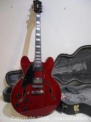 MaxSold Auction: GROTE Electric Guitar With Hard Shell Guitar Case & Two New Packs Of Strings. - Toronto (Ontario, Canada) SELLER MANAGED Estate Sale Online Auction - Annette Street