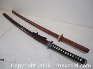 MaxSold Auction: Japan SAMURAI Sword Plus Hard Wood Samurai Practice Sword. - Toronto (Ontario, Canada) SELLER MANAGED Estate Sale Online Auction - Annette Street