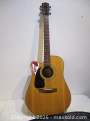 MaxSold Auction: Vintage FENDER Electric Accoustic Guitar. DG-10CELH-NAT. S/N CC;CD04032664. LEFT HAND. - Toronto (Ontario, Canada) SELLER MANAGED Estate Sale Online Auction - Annette Street