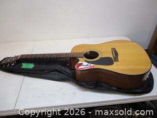 MaxSold Auction: Vintage FENDER Electric Accoustic Guitar. DG-10CELH-NAT. S/N CC;CD04032664. LEFT HAND. - Toronto (Ontario, Canada) SELLER MANAGED Estate Sale Online Auction - Annette Street