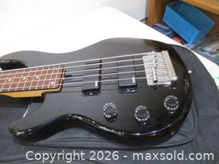 MaxSold Auction: YAMAHA BBN5L-II, BASE GUITAR With Shoulder Bag, Plug-in Wire & Heavy Duty Guitar Shoulder Strap. LEFT HANDED. - Toronto (Ontario, Canada) SELLER MANAGED Estate Sale Online Auction - Annette Street