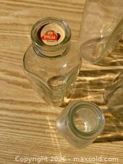MaxSold Auction: Lot of 5 Vintage Clear Glass Milk Bottles with Palm Paper Seal & Embossing - Saanich (British Columbia, Canada) SELLER MANAGED Downsizing Online Auction - Dunsterville Avenue
