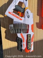 MaxSold Auction: Nerf Ultra Pharaoh & Ultra One Motorized Dart Blasters - Saanich (British Columbia, Canada) SELLER MANAGED Downsizing Online Auction - Dunsterville Avenue