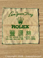 MaxSold Auction: Rolex Printed Velour Polishing/Cleaning Cloth - Saanich (British Columbia, Canada) SELLER MANAGED Downsizing Online Auction - Dunsterville Avenue