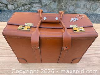 MaxSold Auction: Tan Cognac Leather Briefcase / Attache, Burgundy Lining - Saanich (British Columbia, Canada) SELLER MANAGED Downsizing Online Auction - Dunsterville Avenue