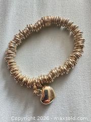 MaxSold Auction: Sterling silver Links of London heavy bracelet with heart charm - Richmond Hill (Ontario, Canada) SELLER MANAGED Downsizing Online Auction - Townwood Drive