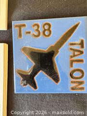 MaxSold Auction: Aviation Memorabilia: O'Hare Pilots' Dinner Booklets & T-38 Tile - Delaware City Township (Ohio, USA) PARTNER MANAGED Downsizing Online Auction - Hillside Drive