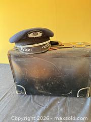 MaxSold Auction: Leather Travel Briefcase with Pilot Cap and Adhered Collectible Stickers  - Delaware City Township (Ohio, USA) PARTNER MANAGED Downsizing Online Auction - Hillside Drive