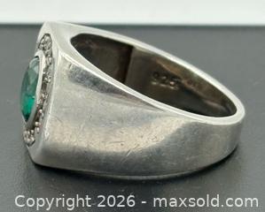 MaxSold Auction: 925 Sterling Silver Men's Signet Ring featuring an oval-cut centre emerald Size 10.5 - Esquimalt (British Columbia, Canada) PARTNER MANAGED Reseller Online Auction -  Lampson Street