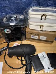 MaxSold Auction: Beauty Tools Lot: Makeup Bags, Hair Dryer, Curling Iron - Mattapoisett (Massachusetts, USA) SELLER MANAGED Moving Online Auction - Crystal Spring Road