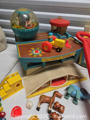 MaxSold Auction: Fisher-Price Vintage Playset & Pull Toys Lot (1970s-1980s) - Henrietta (New York, USA) SELLER MANAGED Reseller Online Auction - Brighton Henrietta Town Line Road (STORAGE)