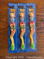 MaxSold Auction:  Vintage Bob the Builder Zooth Toothbrushes Lot of 3 - New in Package (2001/2003) - Toronto (Ontario, Canada) SELLER MANAGED Downsizing Online Auction - Dovercourt Road
