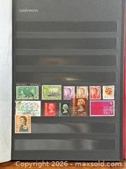 MaxSold Auction: 10 Stock World STAMP ALBUMS - Hamilton (Ontario, Canada) SELLER MANAGED Estate Sale Online Auction - Gertrude Street