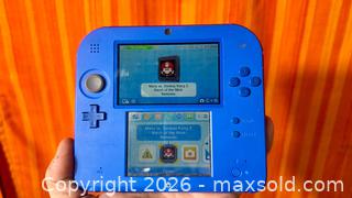 MaxSold Auction: Nintendo 2DS Like New in Box + Mario Vs. Donkey Kong 2 + Mario Cart Built In - Hamilton (Ontario, Canada) SELLER MANAGED Estate Sale Online Auction - Gertrude Street