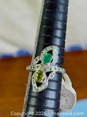 MaxSold Auction: Sterling Silver Leaf Design Ring with Peridot & Green Stones - Hamilton (Ontario, Canada) SELLER MANAGED Estate Sale Online Auction - Gertrude Street