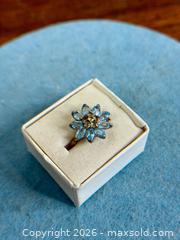 MaxSold Auction: Vintage Style Blue Topaz Flower Ring with Citrine Accent Stones - Hamilton (Ontario, Canada) SELLER MANAGED Estate Sale Online Auction - Gertrude Street