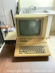MaxSold Auction: Apple II (Apple ][) Computer with Disk II Drive & CRT Monitor - Fayetteville (Georgia, USA) SELLER MANAGED Estate Sale Online Auction - East Camelot Drive