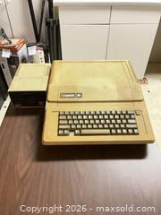 MaxSold Auction: Apple II (Apple ][) Computer with Disk II Drive & CRT Monitor - Fayetteville (Georgia, USA) SELLER MANAGED Estate Sale Online Auction - East Camelot Drive
