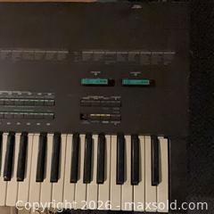 MaxSold Auction: Yamaha DX5 61-Key Digital Synthesizer / Stage Keyboard - Fayetteville (Georgia, USA) SELLER MANAGED Estate Sale Online Auction - East Camelot Drive