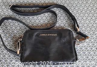 MaxSold Auction: Annick Levesque designer black leather purse. Battery operated interior light - View Royal (British Columbia, Canada) SELLER MANAGED Downsizing Online Auction - Pheasant Lane