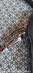 MaxSold Auction: Annick Levesque designer black leather purse. Battery operated interior light - View Royal (British Columbia, Canada) SELLER MANAGED Downsizing Online Auction - Pheasant Lane
