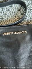 MaxSold Auction: Annick Levesque designer black leather purse. Battery operated interior light - View Royal (British Columbia, Canada) SELLER MANAGED Downsizing Online Auction - Pheasant Lane