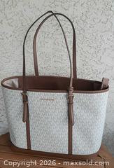 MaxSold Auction: Michael Kors jet set travel bag. New with tags. - View Royal (British Columbia, Canada) SELLER MANAGED Downsizing Online Auction - Pheasant Lane