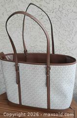 MaxSold Auction: Michael Kors jet set travel bag. New with tags. - View Royal (British Columbia, Canada) SELLER MANAGED Downsizing Online Auction - Pheasant Lane